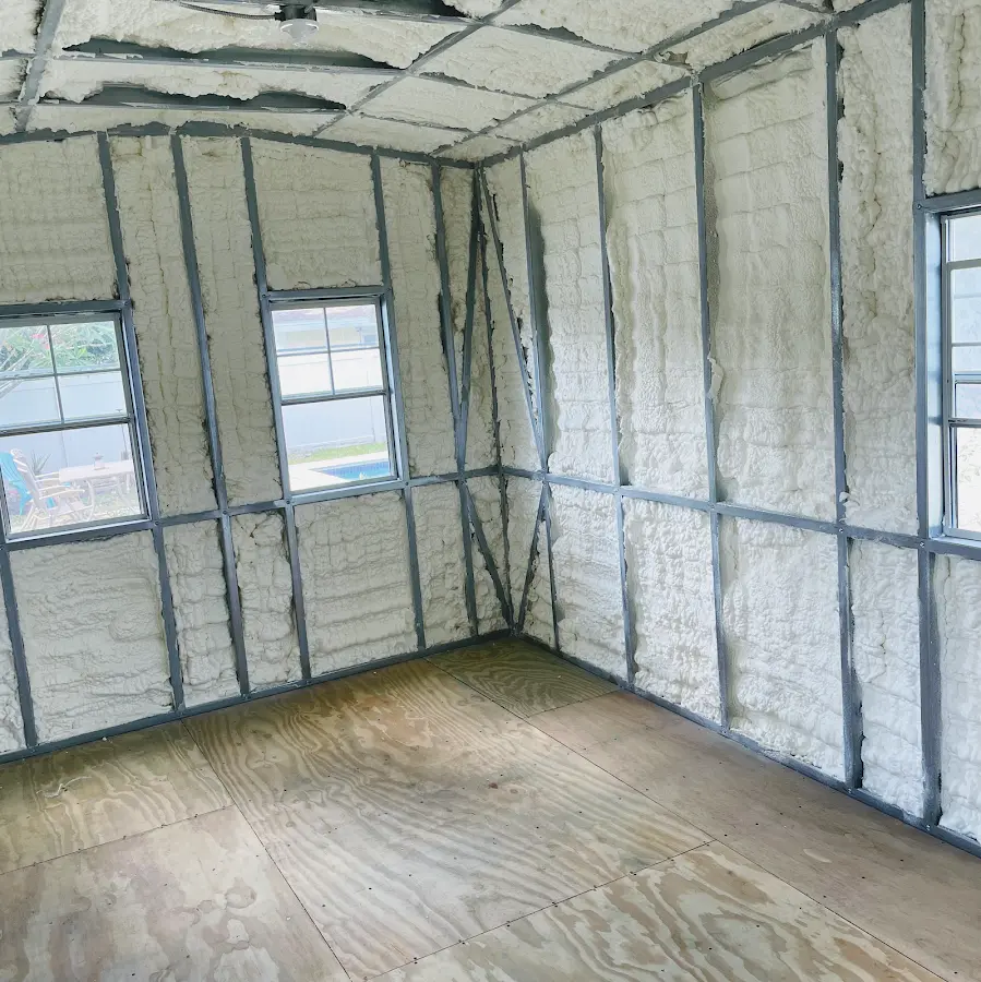 Closed-cell spray foam insulation applied to wall cavities in a residential project in Marlboro